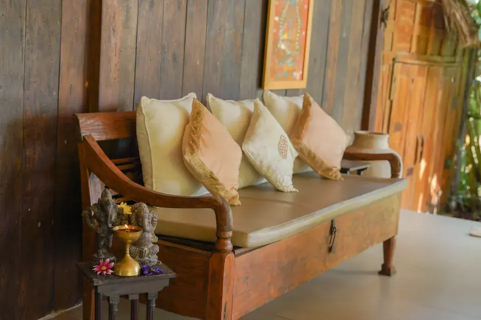 The wooden daybed and sitting area at the spa